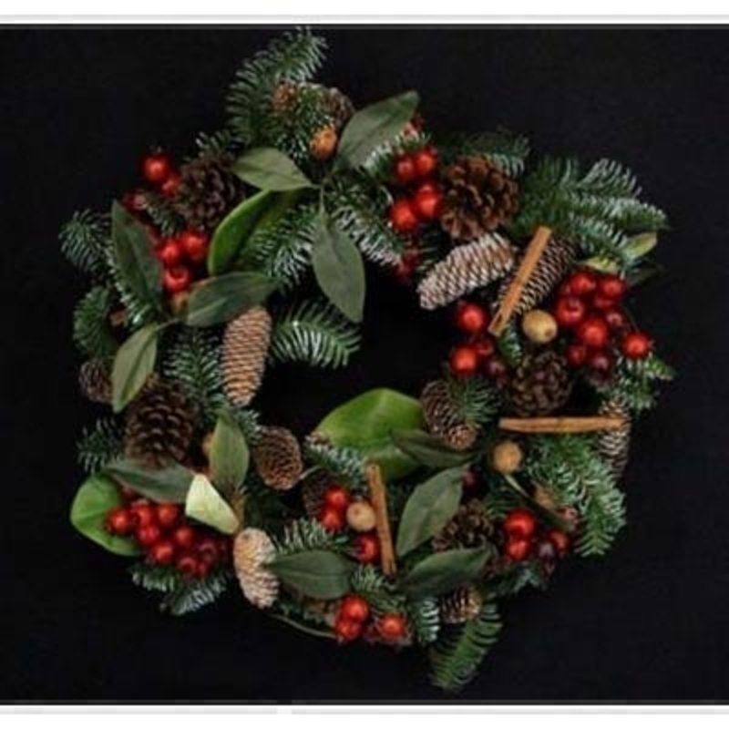 This traditional wreath brings a lovely festive feel to your home and can be used year after year. Decorated with pinecones red berries and cinnamon sticks. Matching garland available. Approx size (LxWxD) 55x55x15cm.